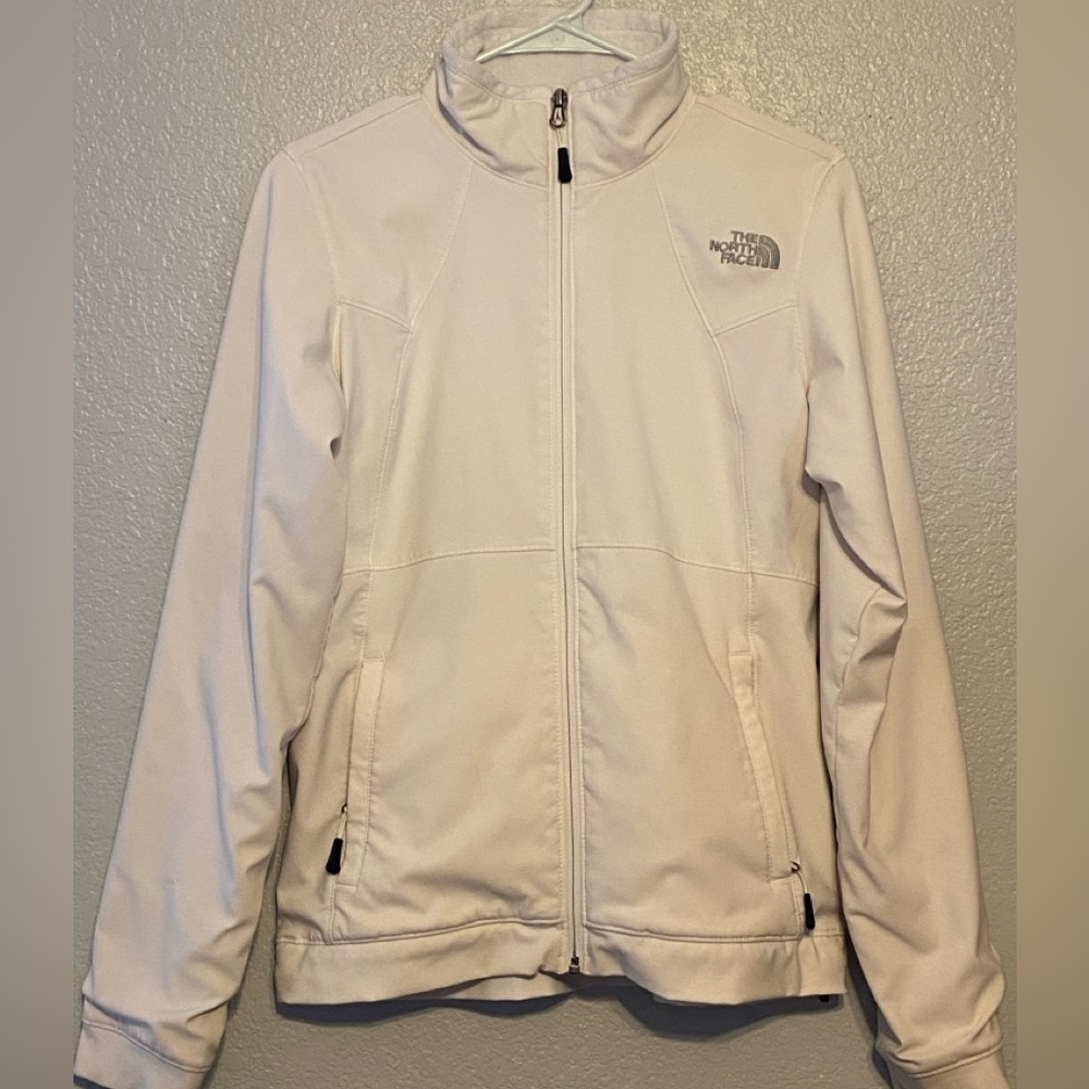 The North Face white zip up jacket